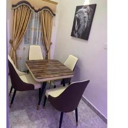 QUALITY DESIGNED BROWN MARBLE DINING TABLE WITH 4 CHAIRS - AVAILABLE (MOBIN)  - deluxe.com.ng